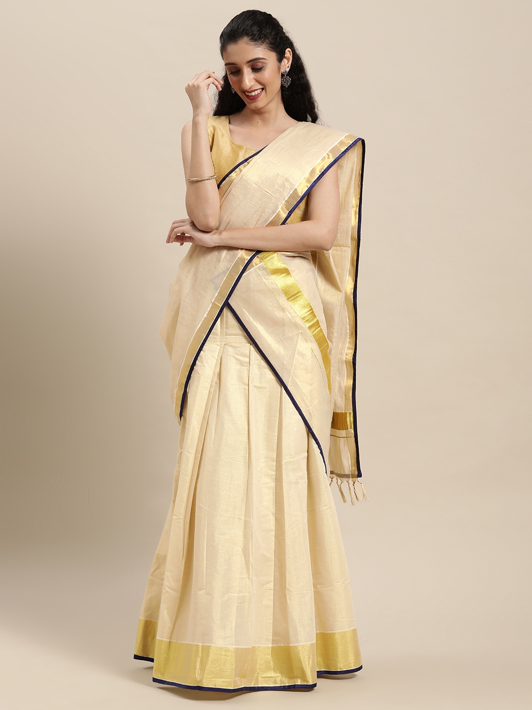 

Thara Sarees Off White Ethnic Motifs Kasavu Lehenga Saree