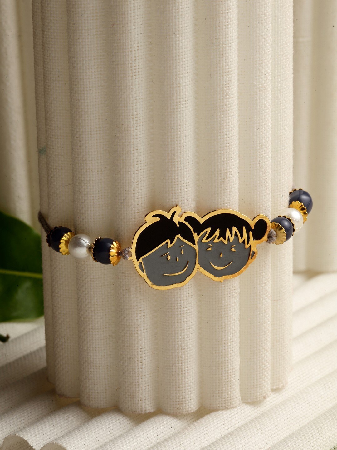 

PANASH Boys Gold-Toned & Grey Pearl Beaded Brass Handcrafted Rakhi