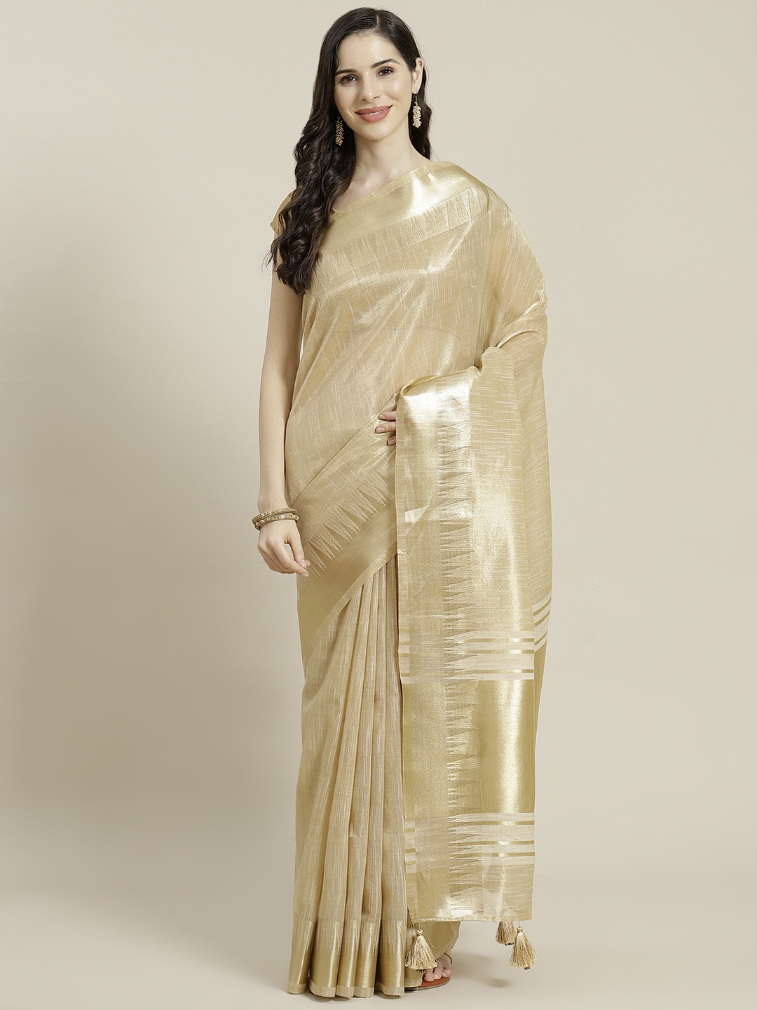

Libas Beige & Golden Solid Saree
