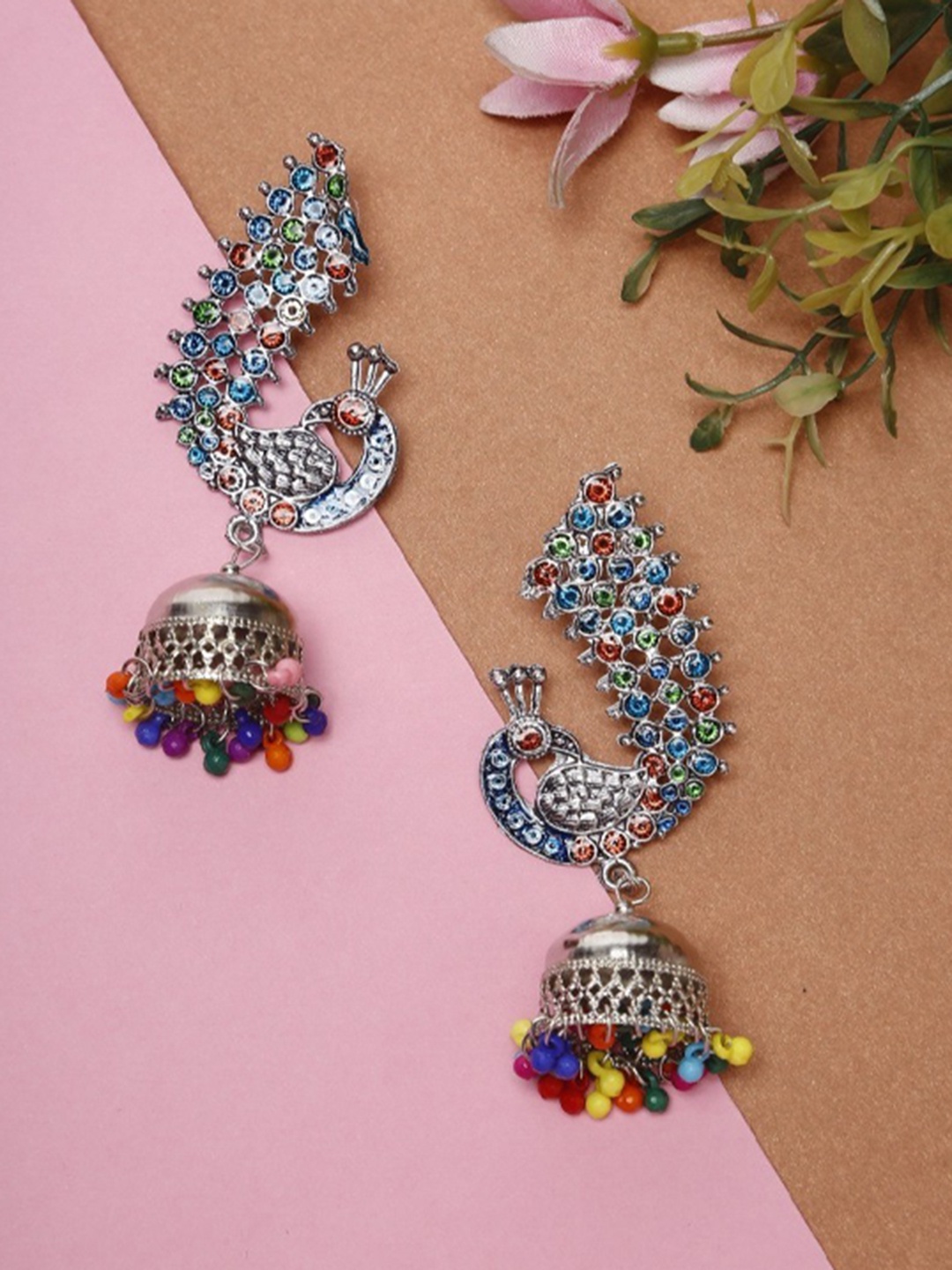 

NEUDIS Silver-Plated & Blue Oxidised Handcrafted Peacock Shaped Jhumkas