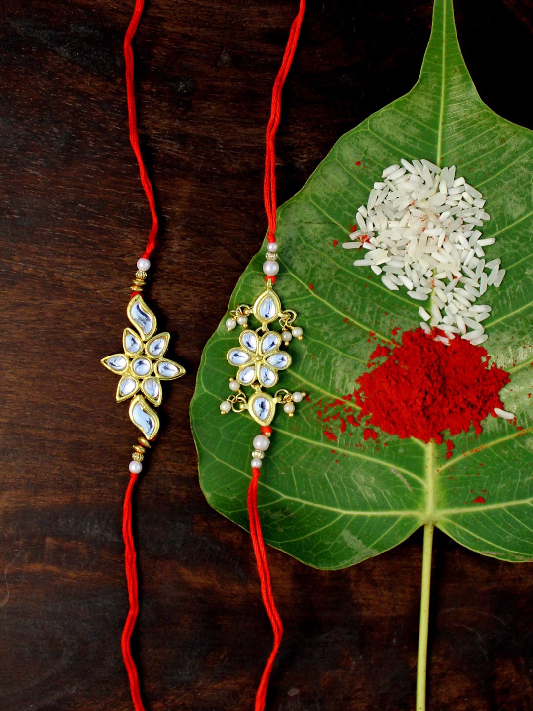 

KARATCART Set of 2 Red & Gold-Plated Kundan Rakhi