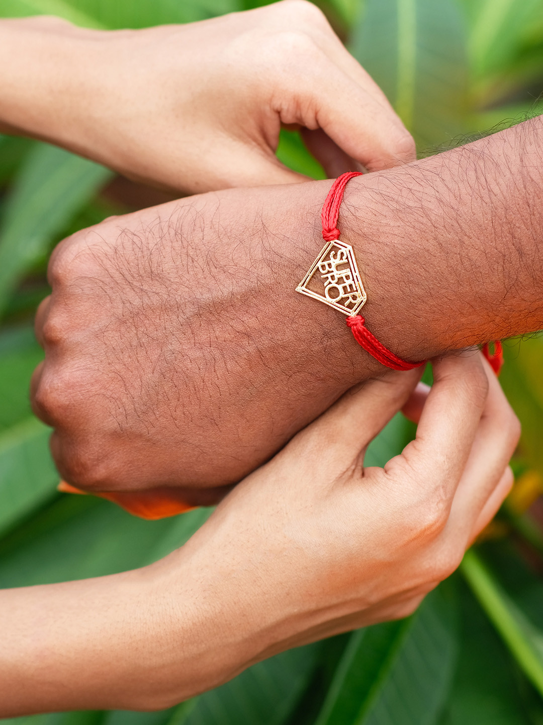

Ayesha Mens Gold & Red Adjustable Superbro Rakhi Bracelet