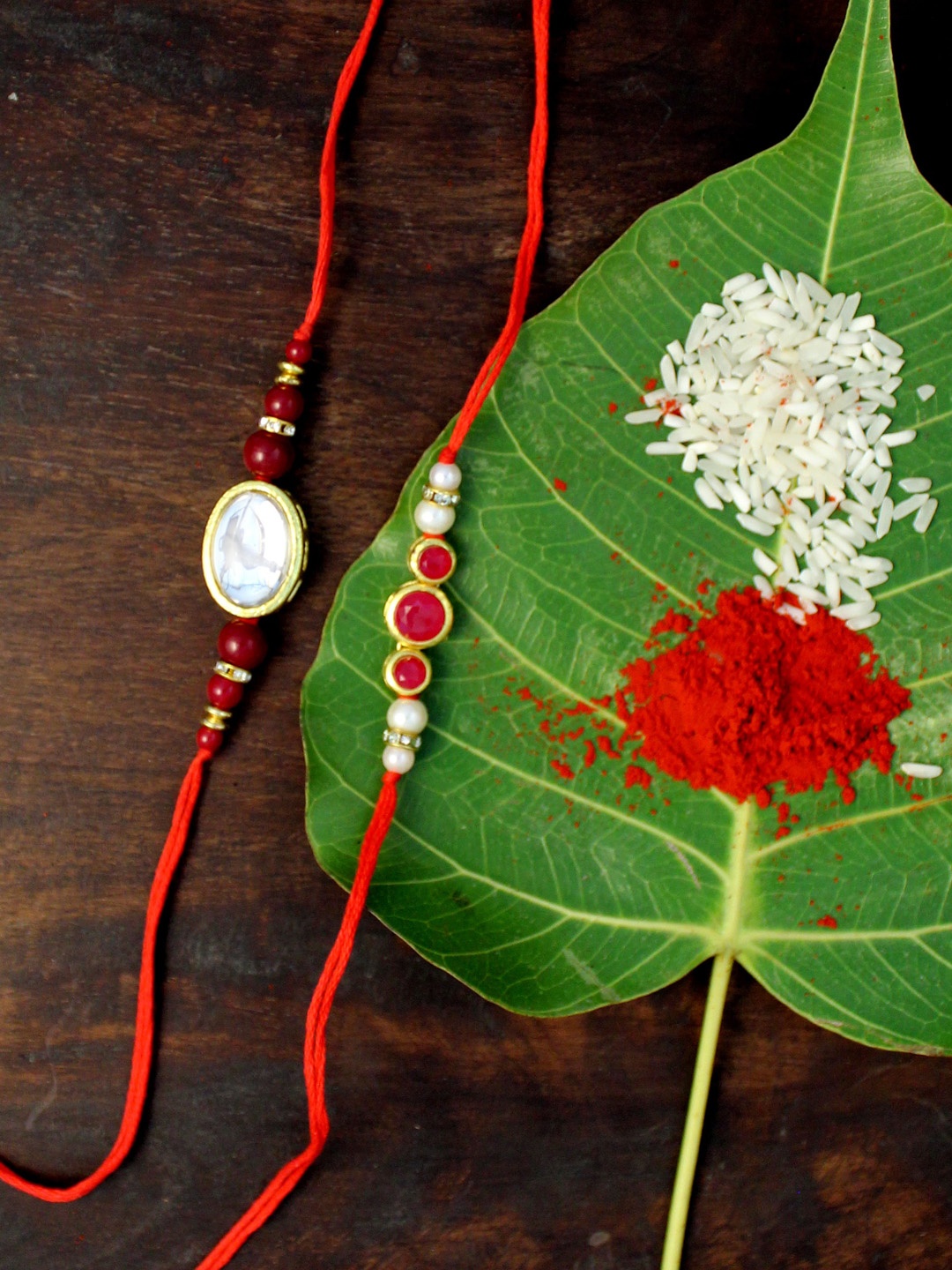 

KARATCART Red & Gold Set of 2 Kundan Rakhi Set