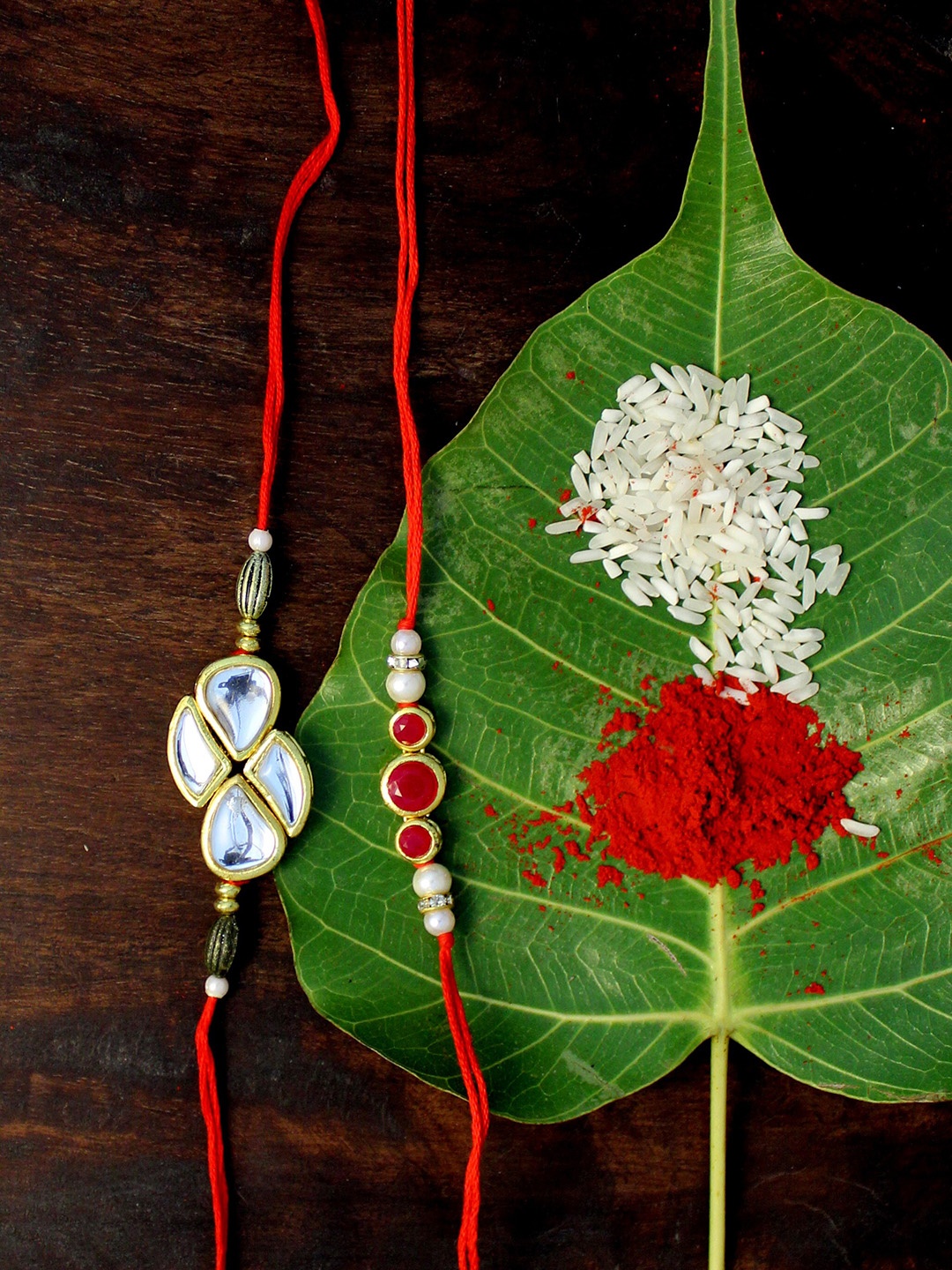 

KARATCART Red Set of 2 Gold-Plated Kundan Rakhi