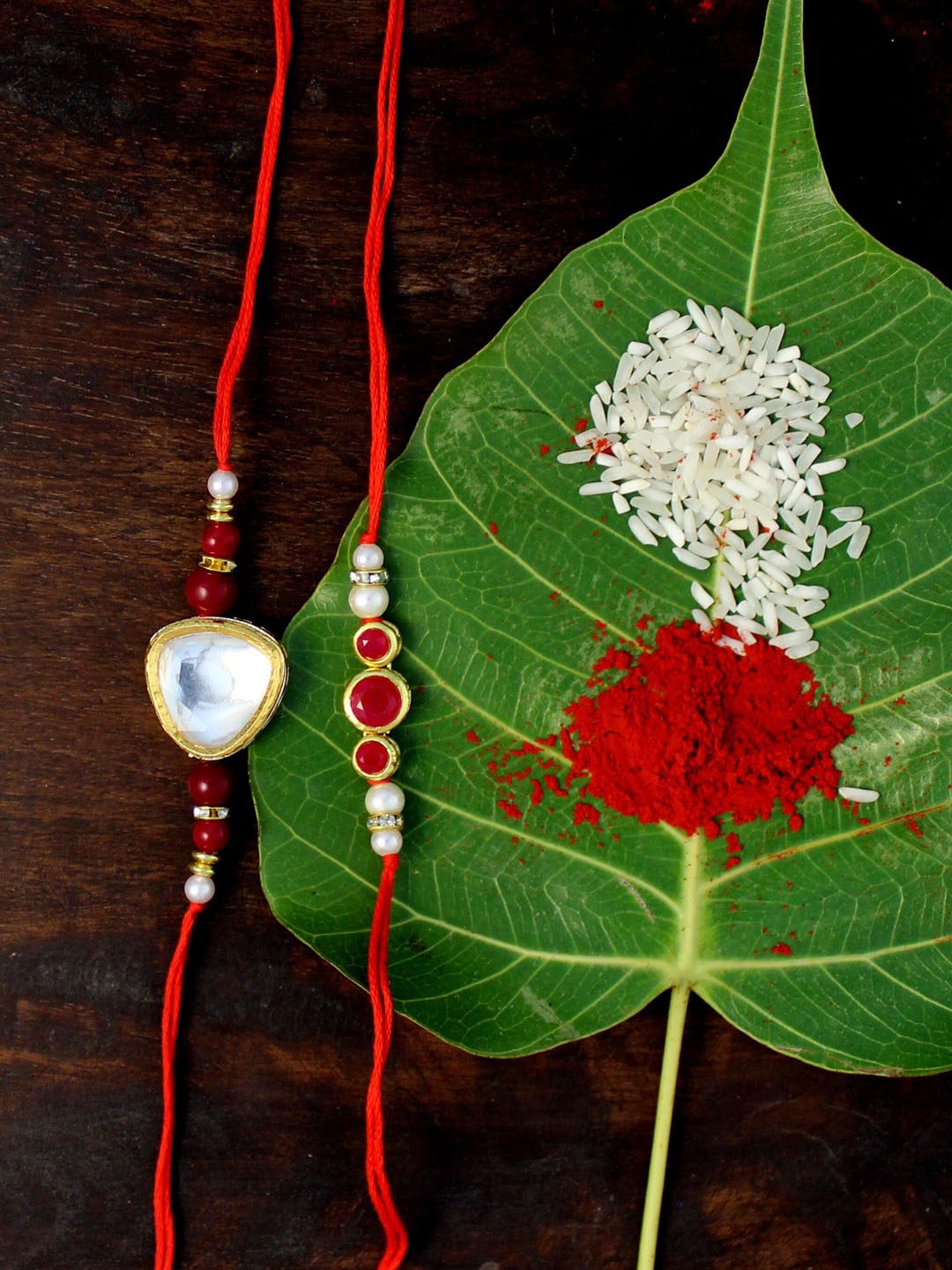 

KARATCART Red Set of 2 Gold-Plated Kundan Rakhi