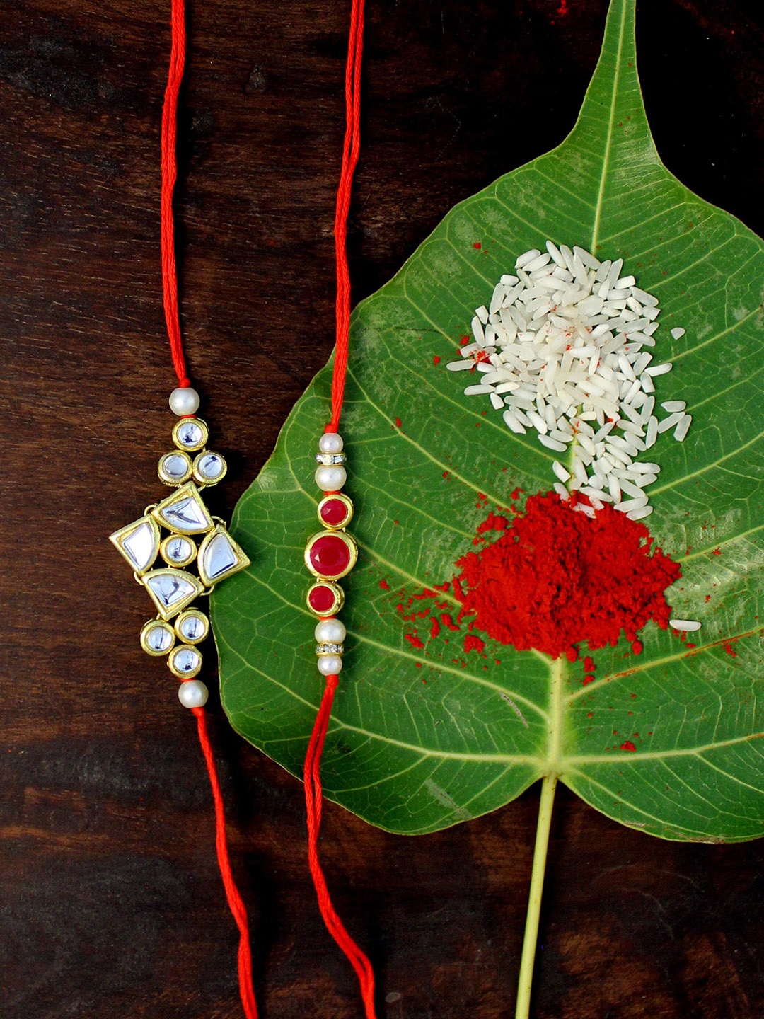 

KARATCART Red Set of 2 Gold-Plated Kundan Rakhi