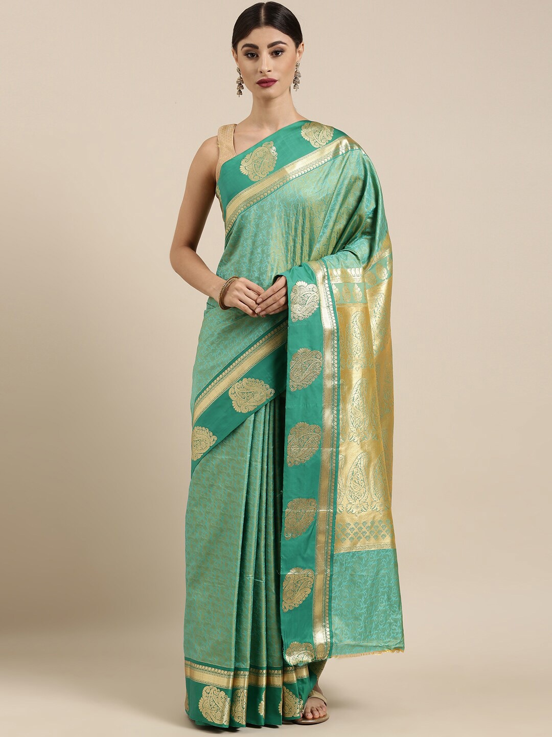 

The Chennai Silks Green & Gold-Toned Ethnic Motifs Zari Art Silk Fusion Saree