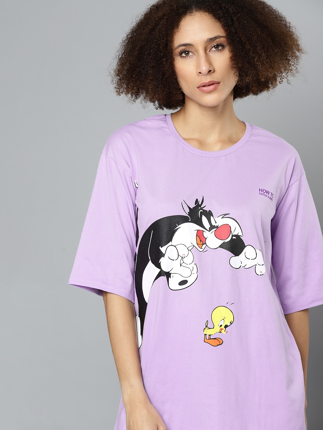 

Kook N Keech Looney Tunes Women Lavender & Black Looney Tunes Printed Extended Sleeves Loose T-shirt