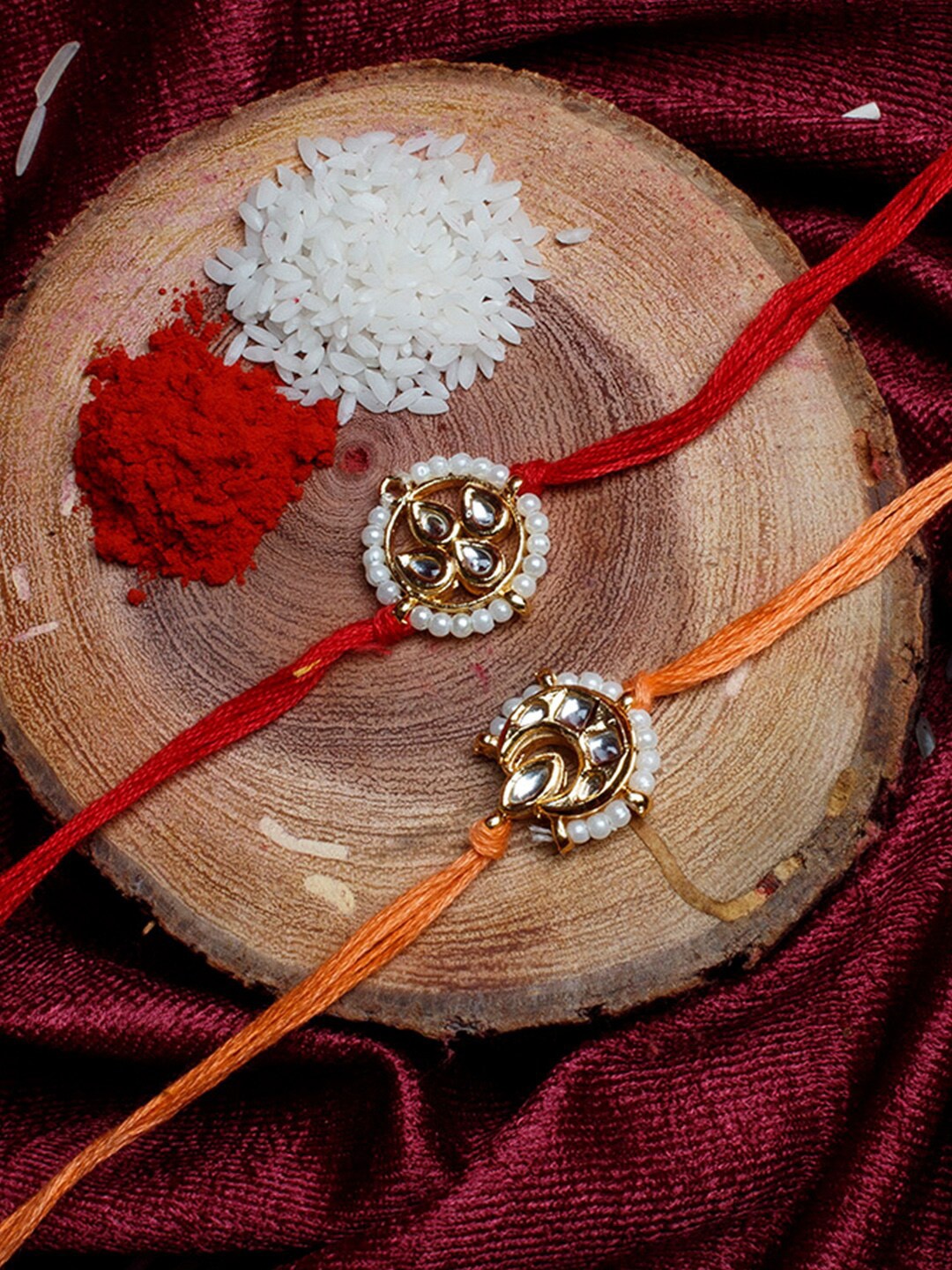 

Shoshaa Set of 2 Gold-Plated Red & Orange Kundan & Beads Combo Bhai Rakhi
