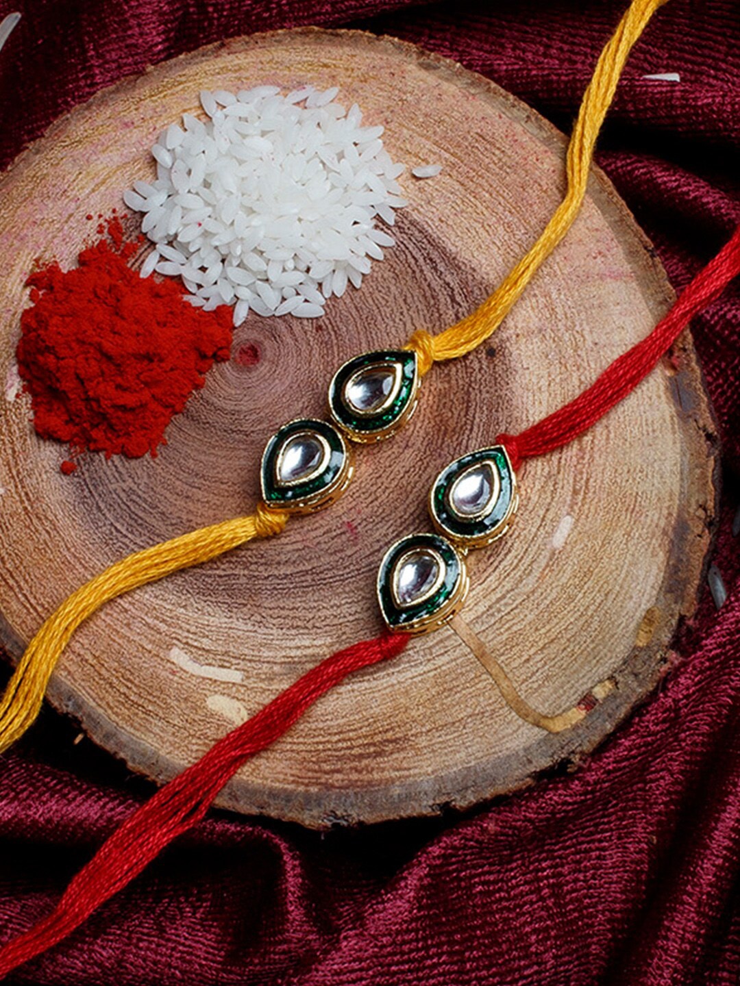 

Shoshaa Gold-Toned & Yellow Set of 2 Kundan Bhai Rakhi