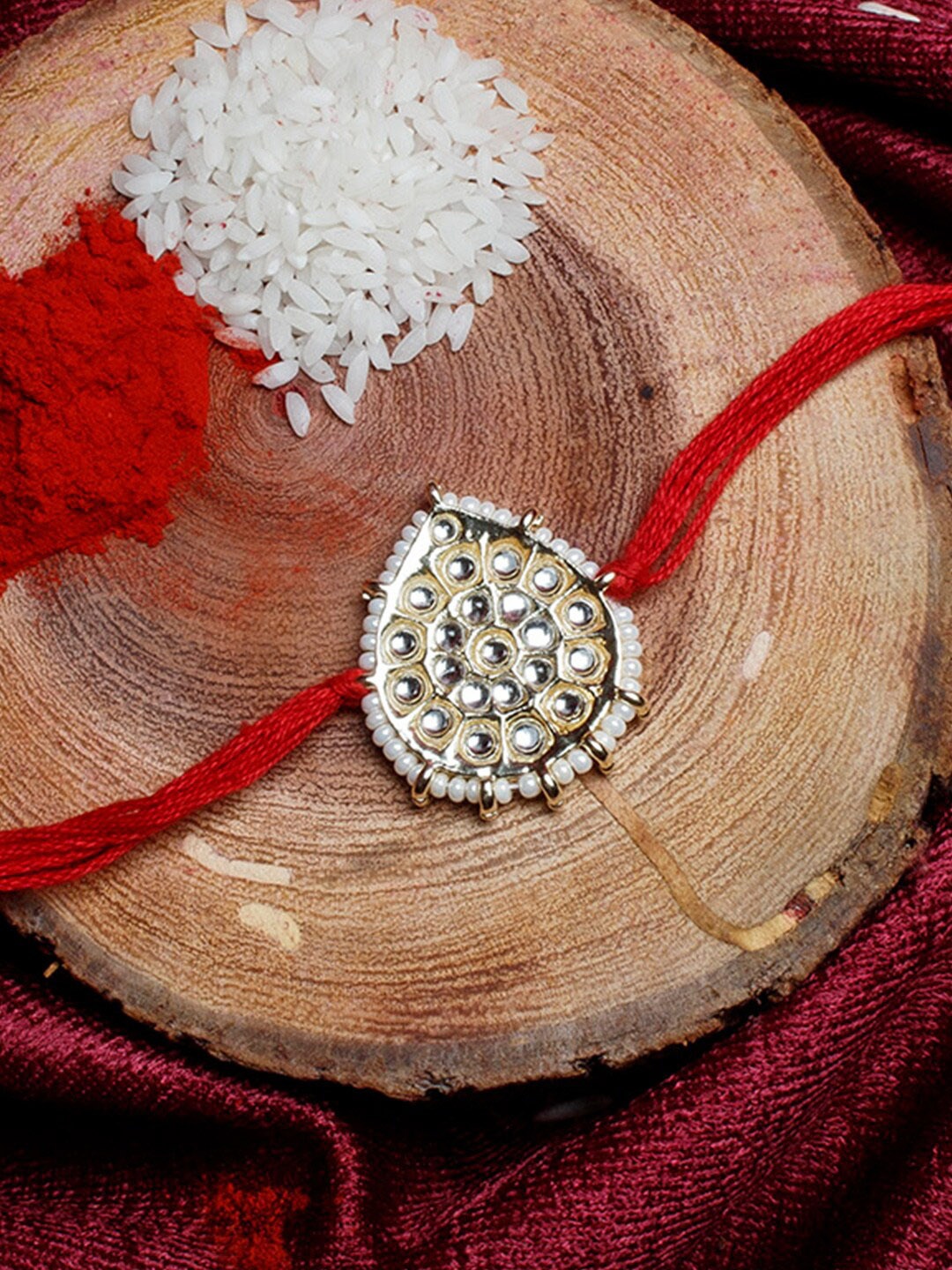 

Shoshaa Gold-Toned & Red Beaded Studded Bhai Rakhi