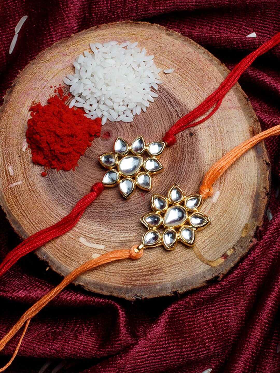 

Shoshaa Set of 2 Gold-Plated Red & Orange Kundan Combo Bhai Rakhi