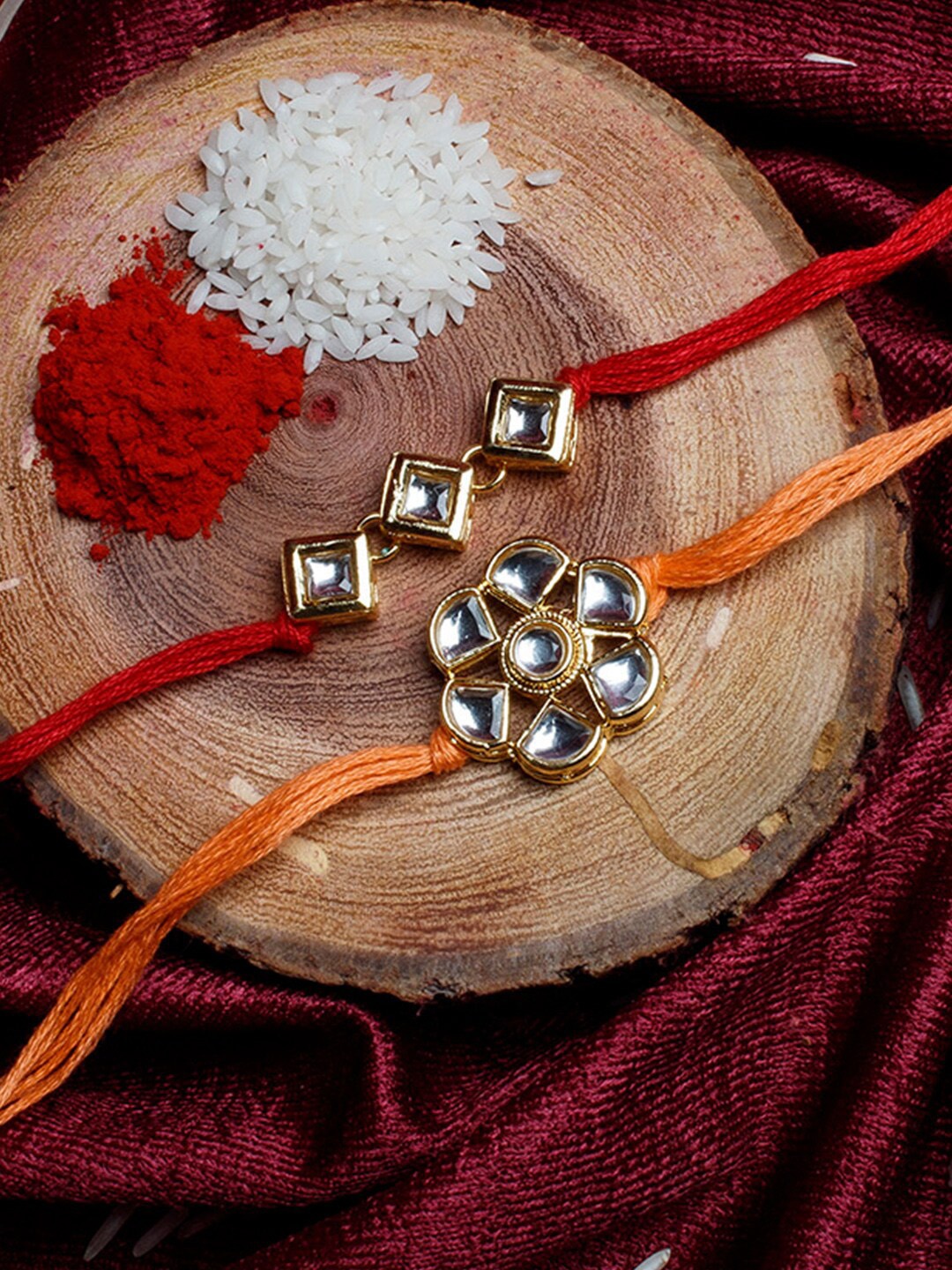 

Shoshaa Gold-Toned & Orange Set of 2 Kundan Designer Bhai Rakhi