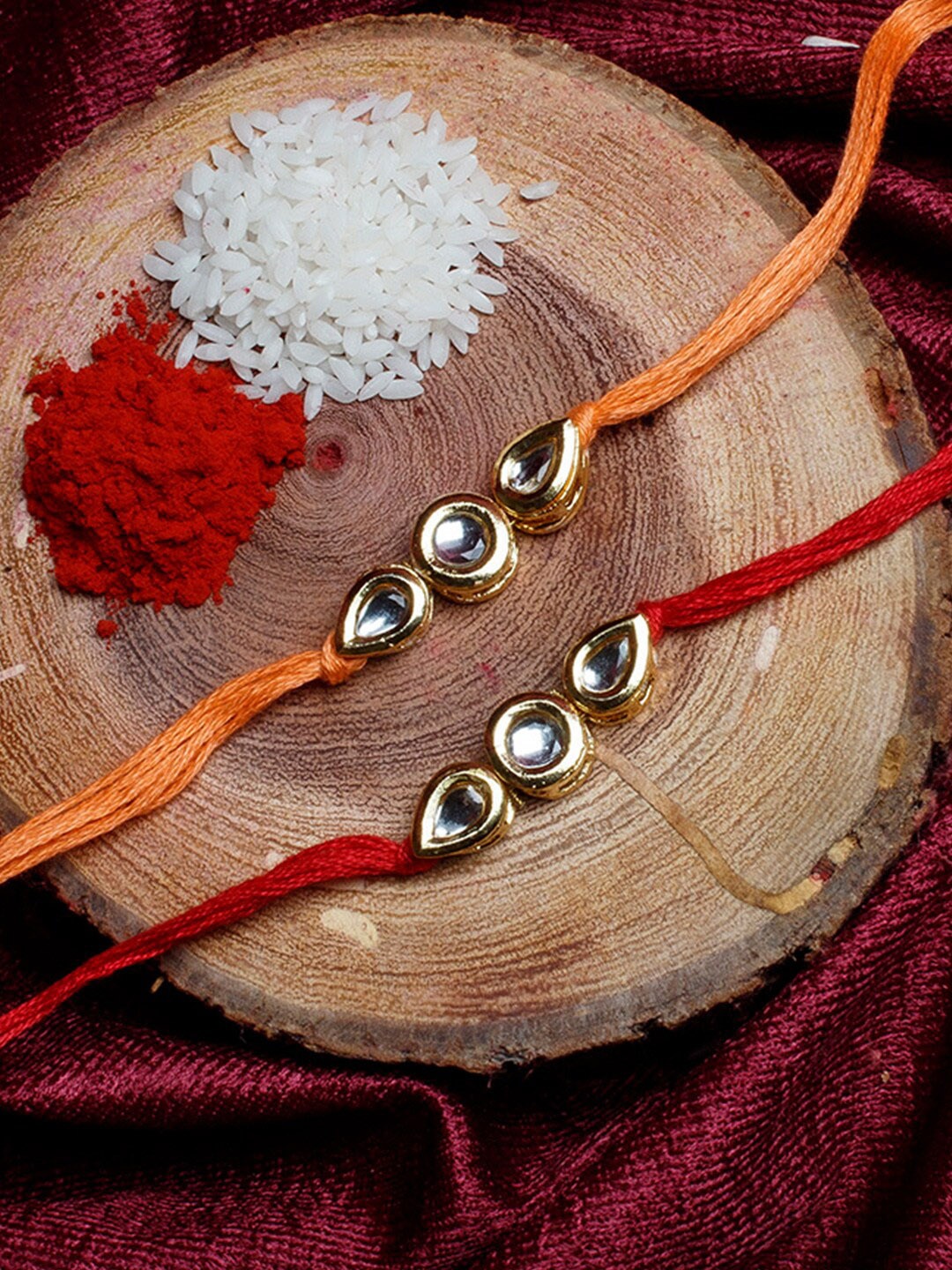 

Shoshaa Gold-Toned & Red Set of 2 Kundan Bhai Rakhi