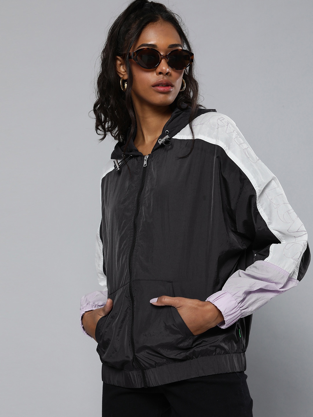 

Levi's x Deepika Padukone Women Black Hooded Tracksuit Jacket