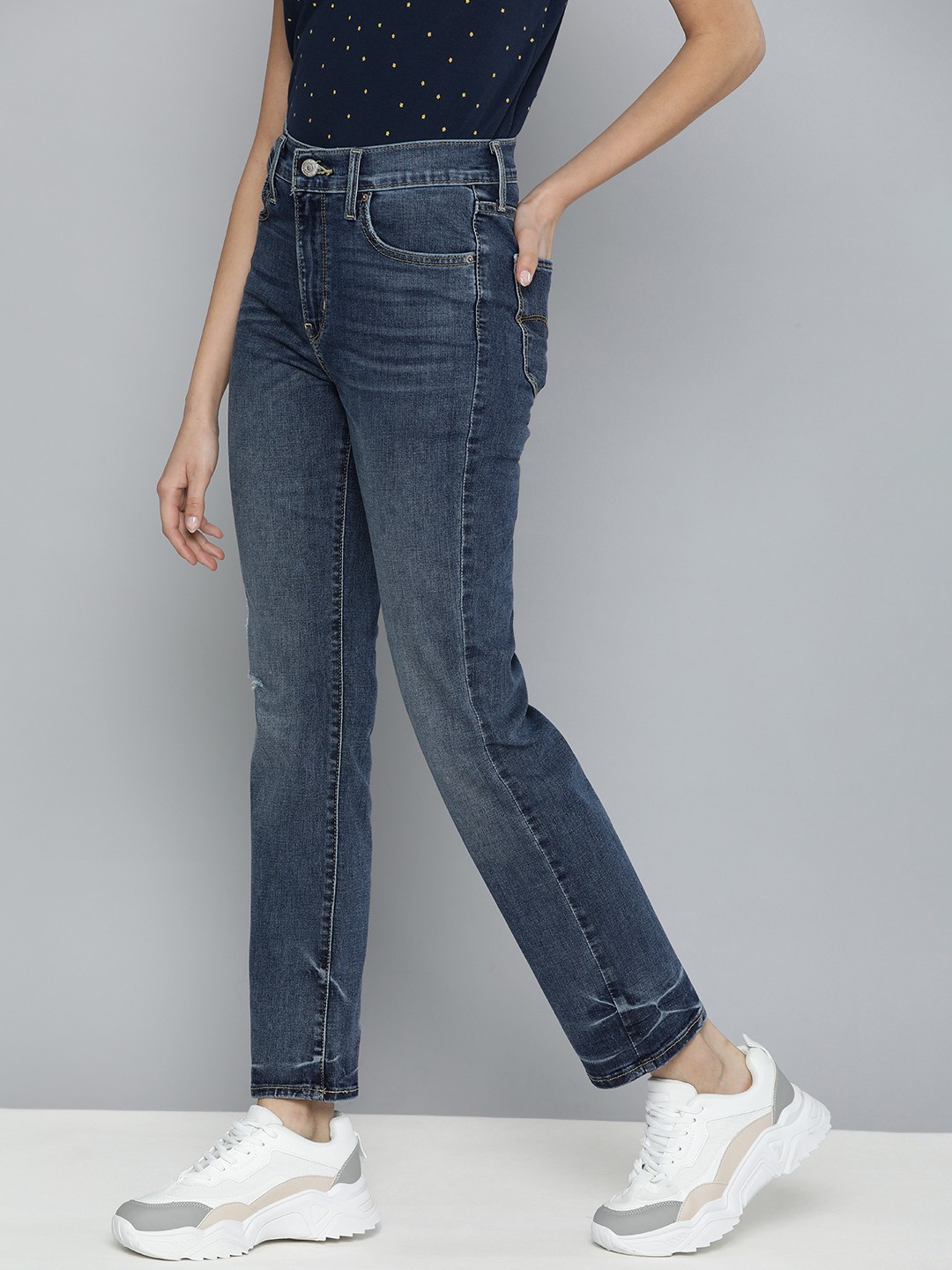 

Levis Women Blue Straight Fit High-Rise Low Distress Heavy Fade Stretchable Jeans
