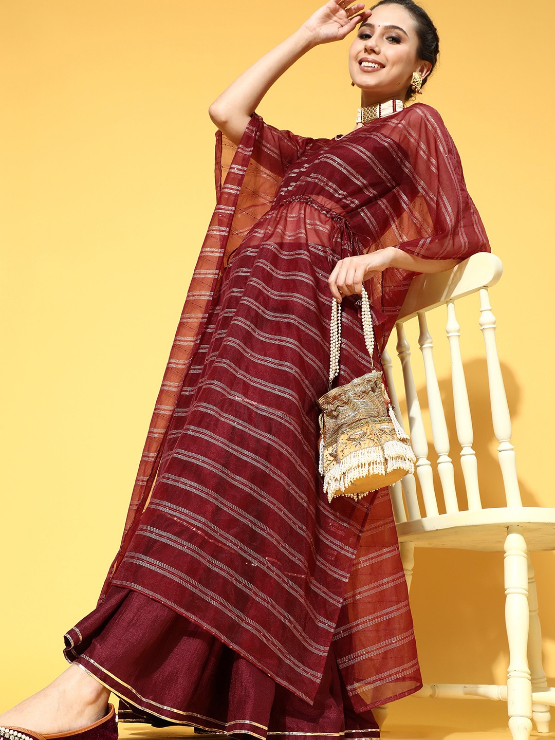 

Indo Era Elegant Maroon Woven Design Kurta with Solid Sharara