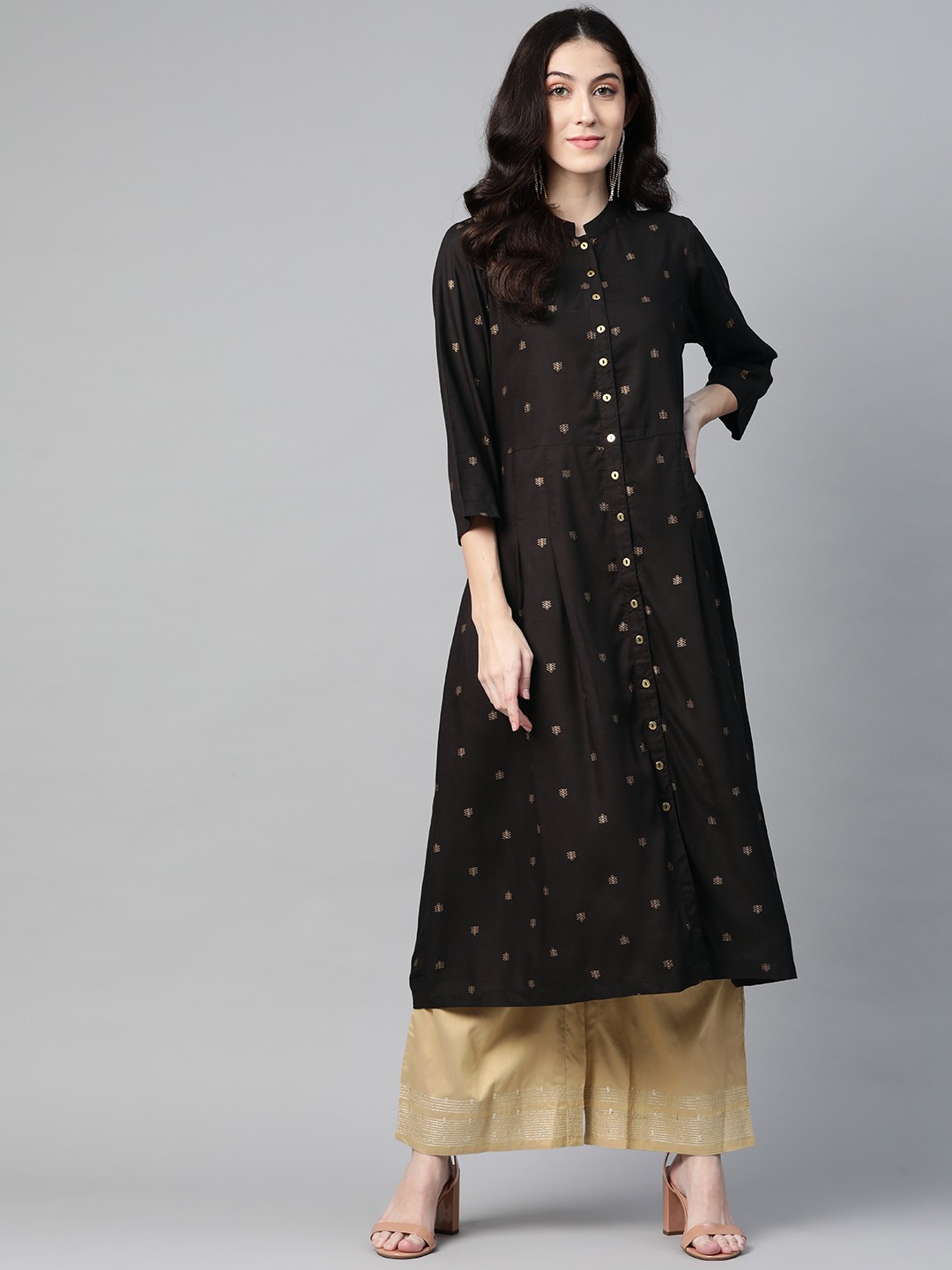 

Ayaany Women Black & Golden Ethnic Motifs Print Cotton Pleated A-line Kurta