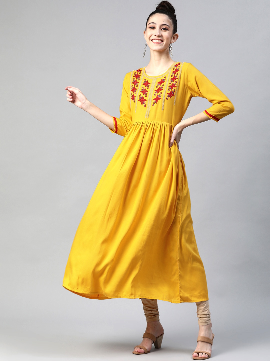 

mokshi Women Yellow & Red Yoke Design Thread Work A-Line Kurta