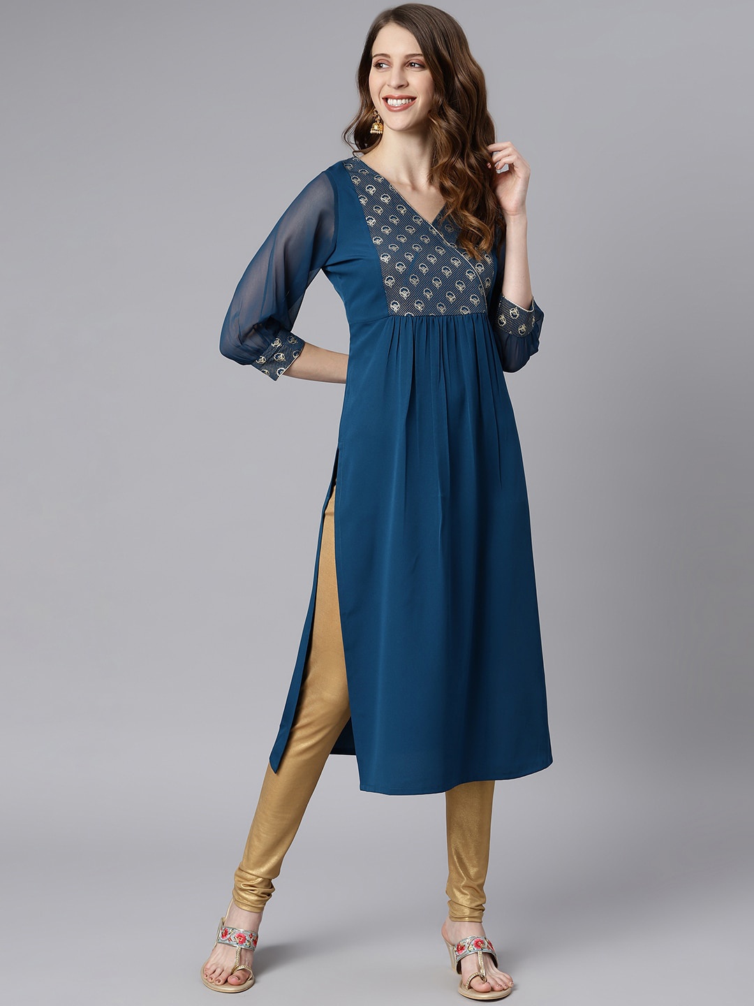 

Janasya Women Teal Blue & Gold Printed Ethnic Motifs Yoke Design Crepe Kurta