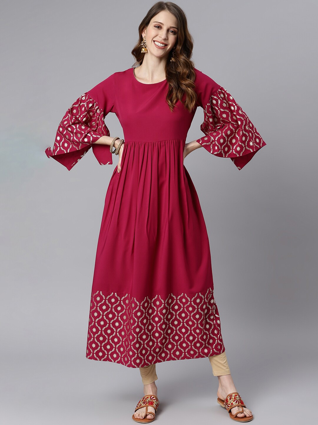 

Janasya Women Magenta & Gold-Toned Ethnic Motifs Flared Sleeves Crepe Kurta