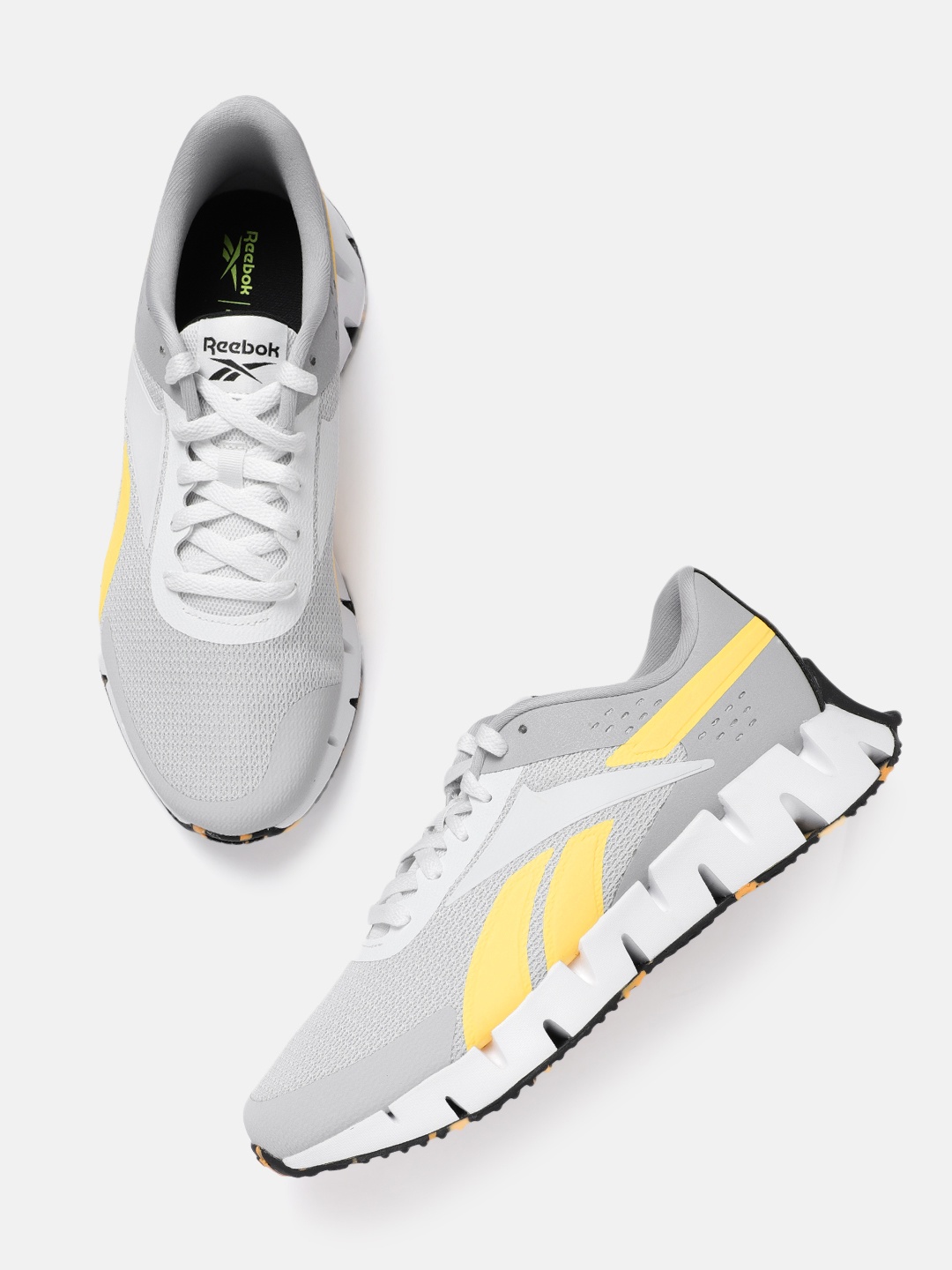 

Reebok Men Grey & Yellow Zig Dynamica 2.0 Woven Design Running Shoes