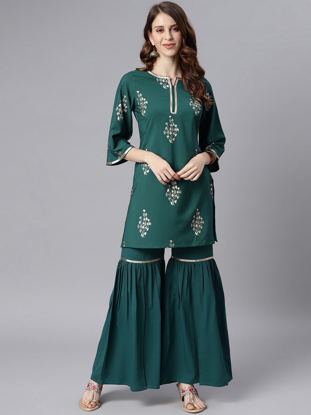 

Janasya Women Teal Green & Golden Ethnic Motifs Printed Kurta with Sharara