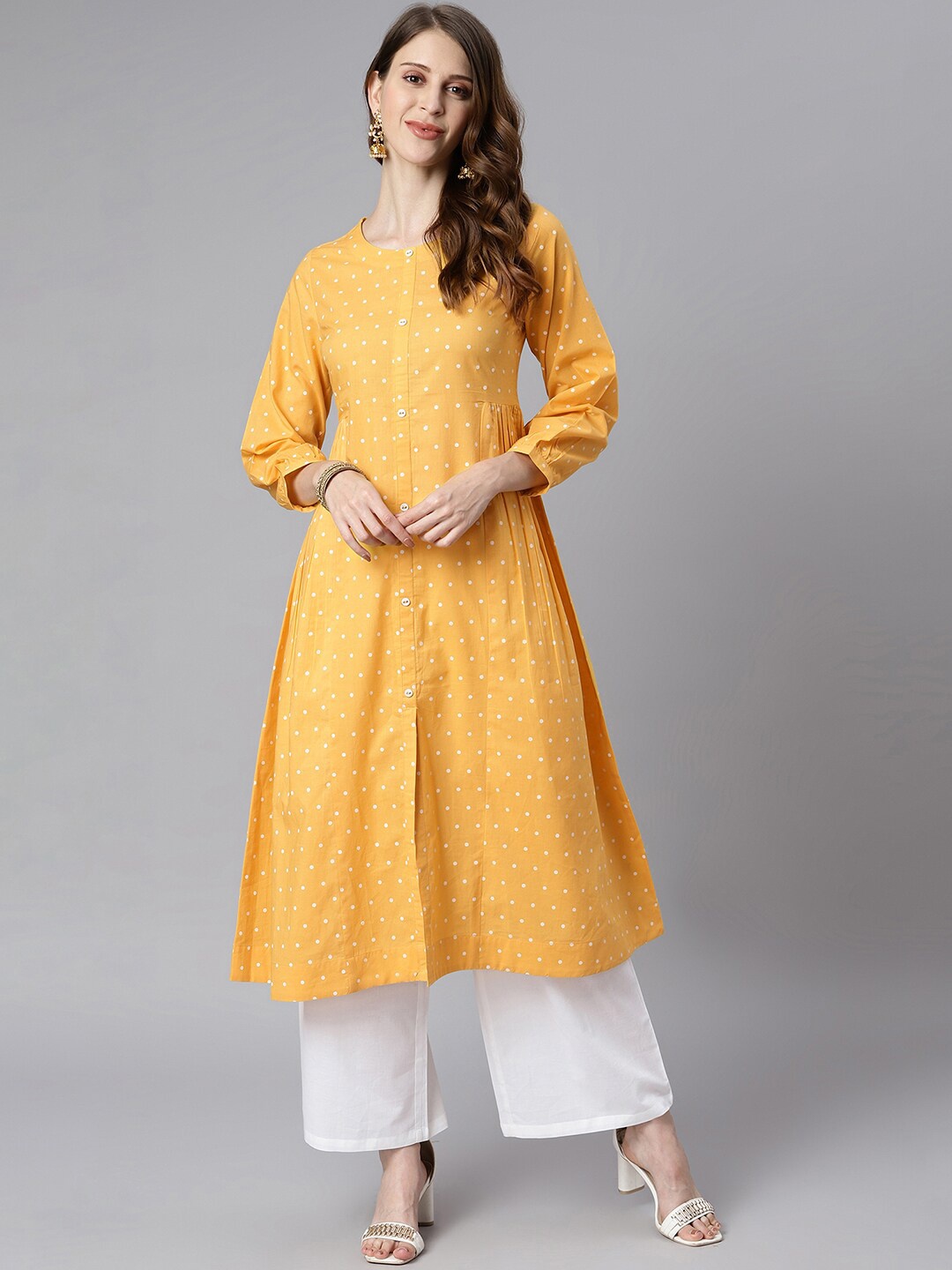 

Janasya Women Mustard Yellow & White Printed Pleated Pure Cotton Kurta with Palazzos