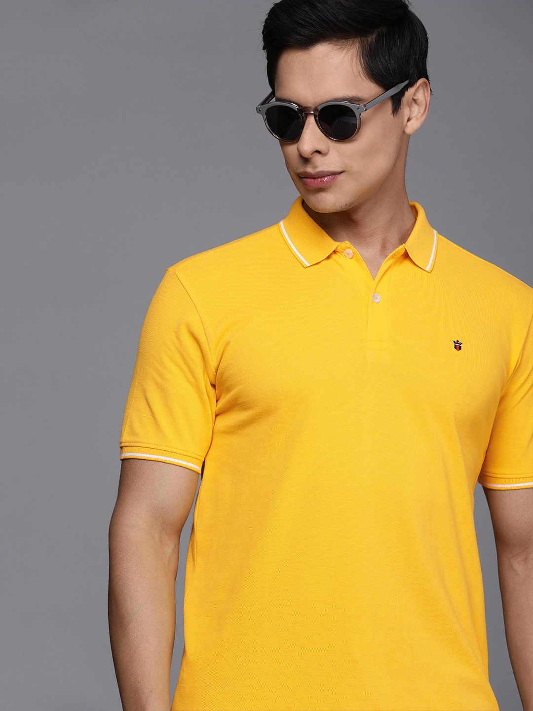 

Louis Philippe Jeans Men Mustard Yellow Solid Cotton Polo Collar T-shirt