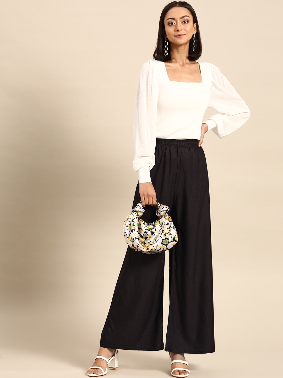 

Saadgi Women Black Solid Ethnic Straight Palazzos