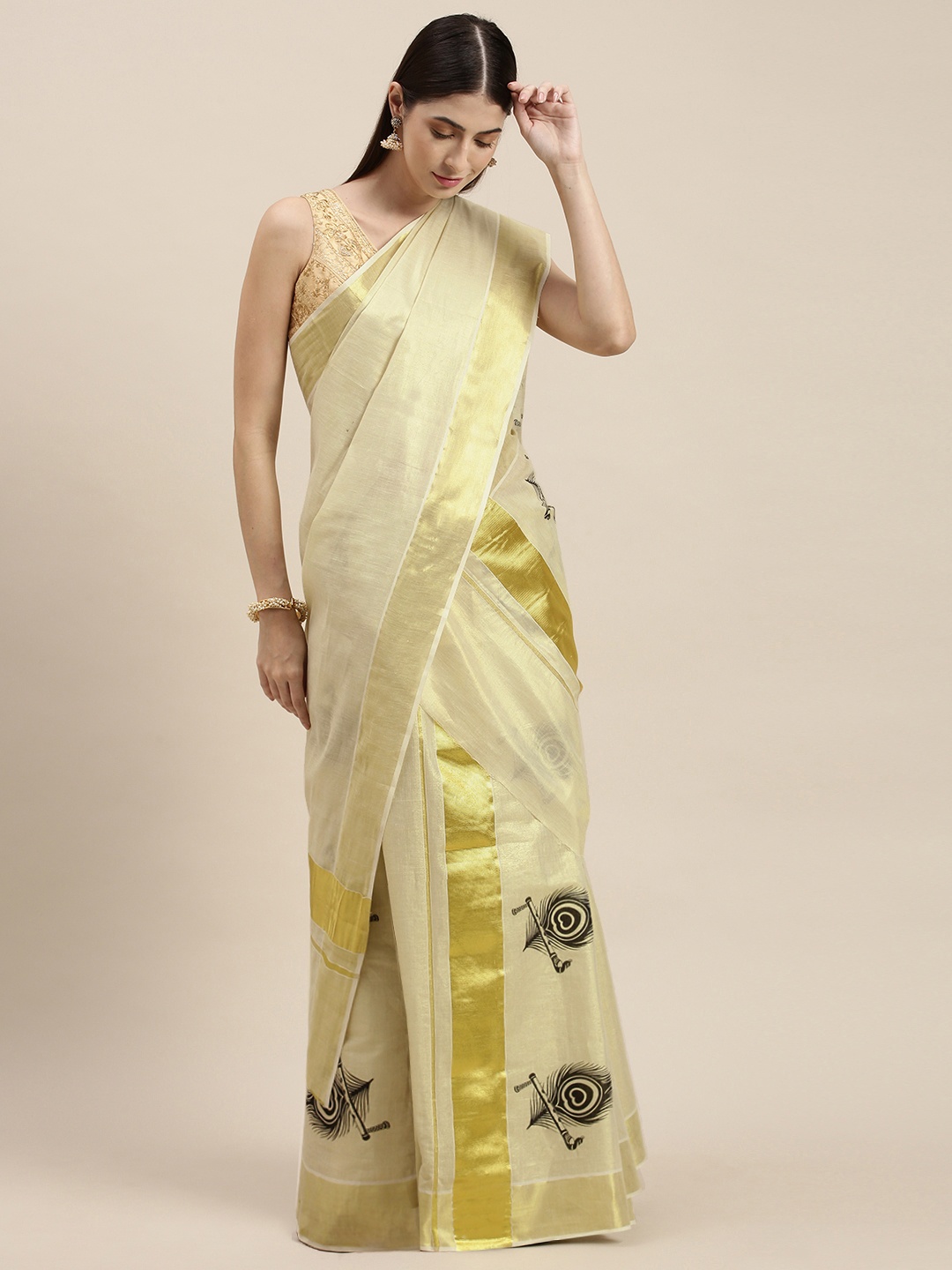 

Thara Saree Off White Ethnic Motifs Zari Pure Cotton Kasavu Mundu Sarees