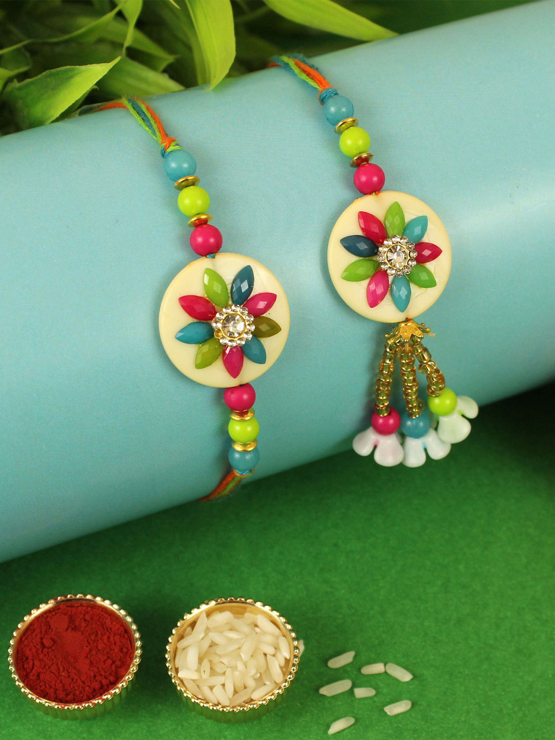 

TIED RIBBONS Multicoloured Rakhi with Card Roli Chawal & Potli Bag Gift Set, Multi