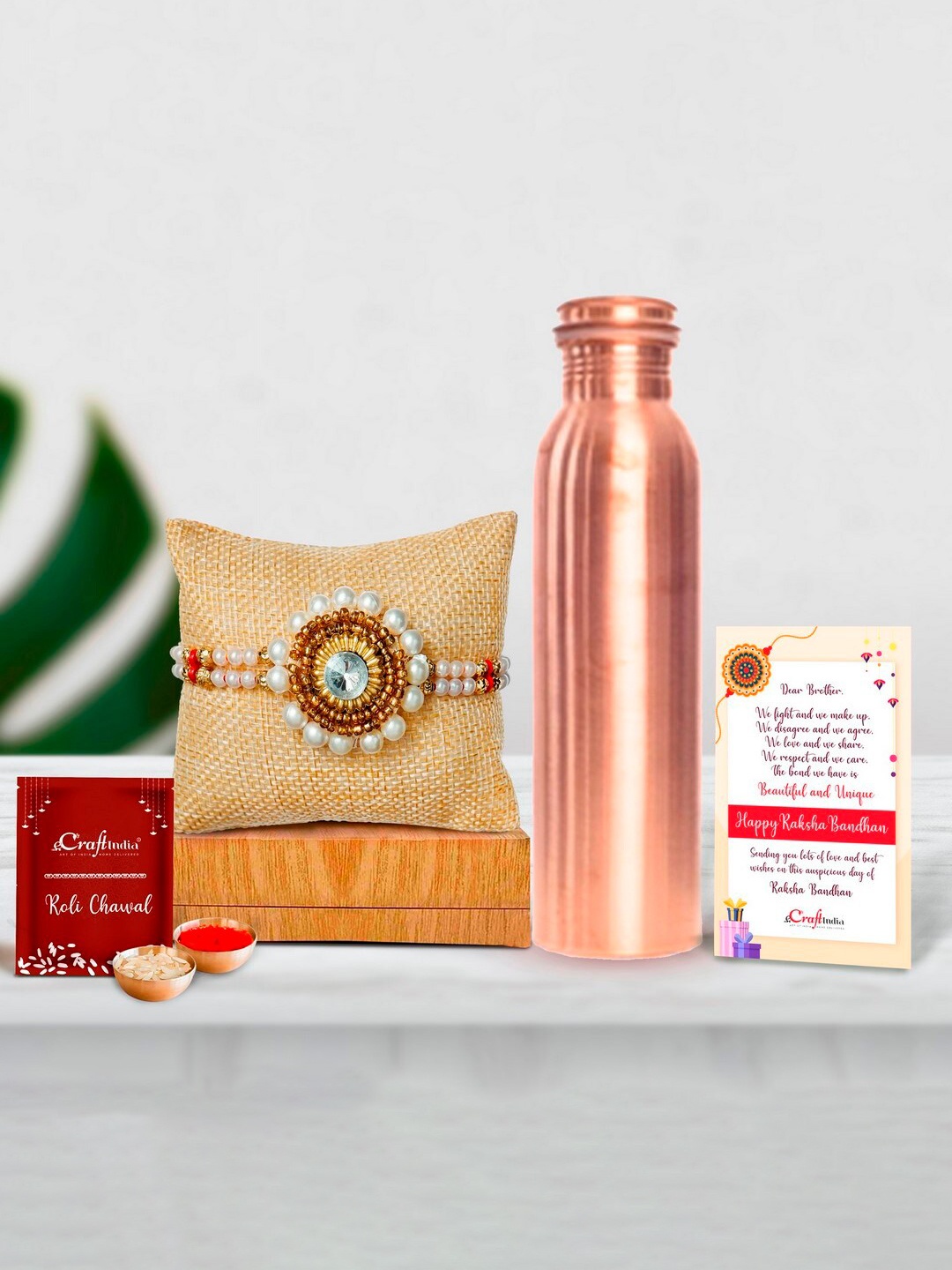 

eCraftIndia Gold-Toned & White Rakhi Gift Set