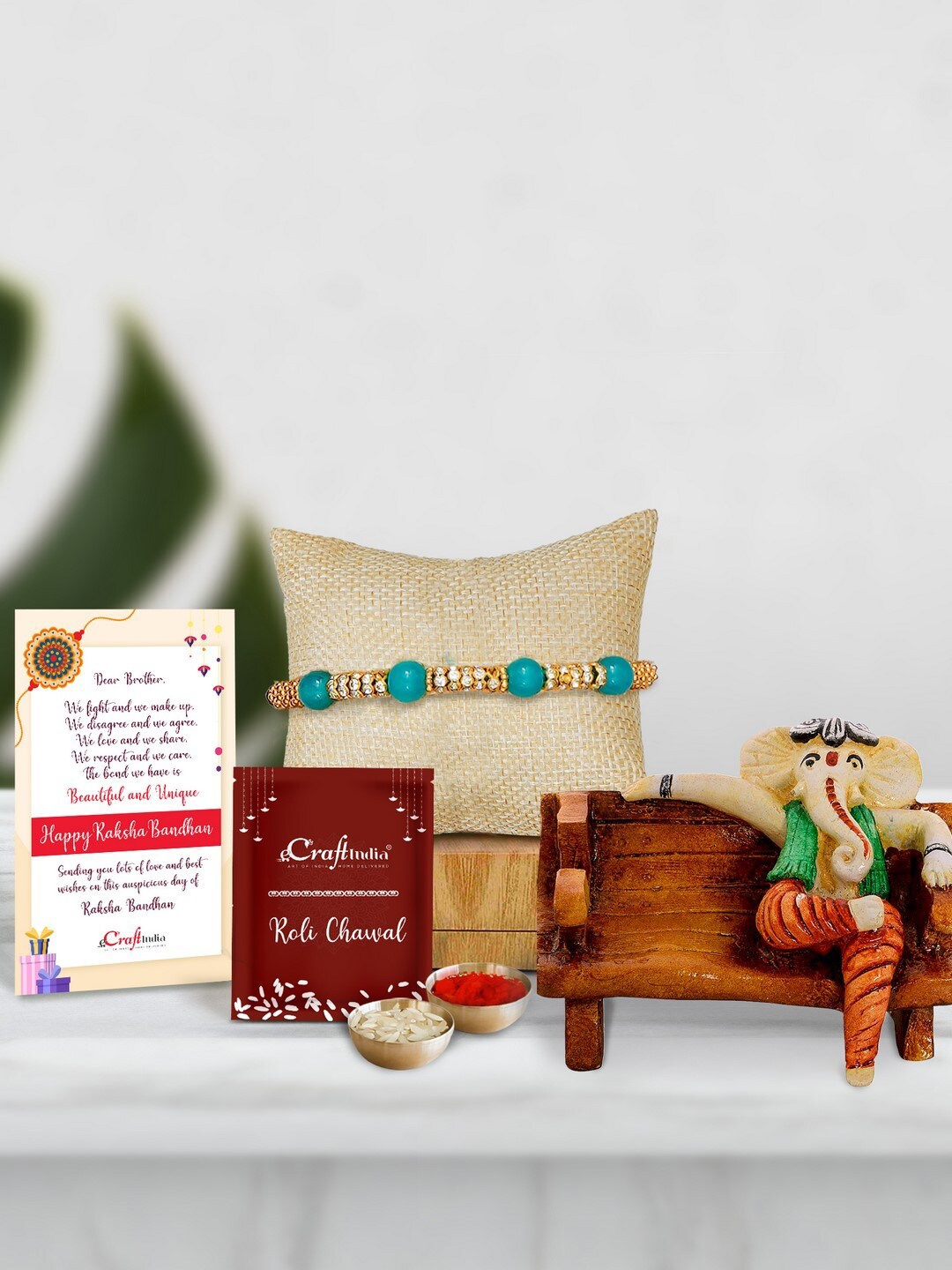 

eCraftIndia Beaded Rakhi With Ganesha Visiting Card Holder & Roli Chawal Greeting Card, Blue