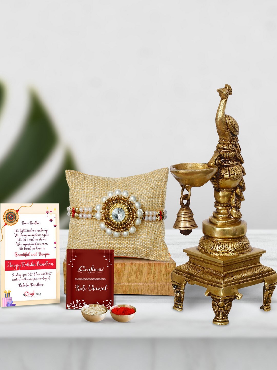 

eCraftIndia Gold-Toned & White Rakhi Gift Set