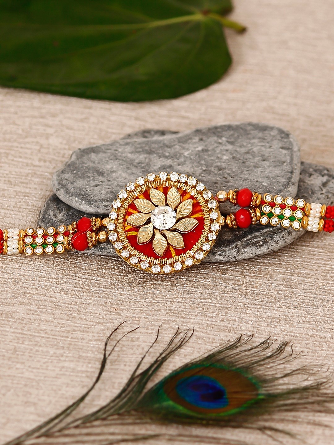 

eCraftIndia Gold-Toned Rakhi With Roli Chawal & Greeting Card