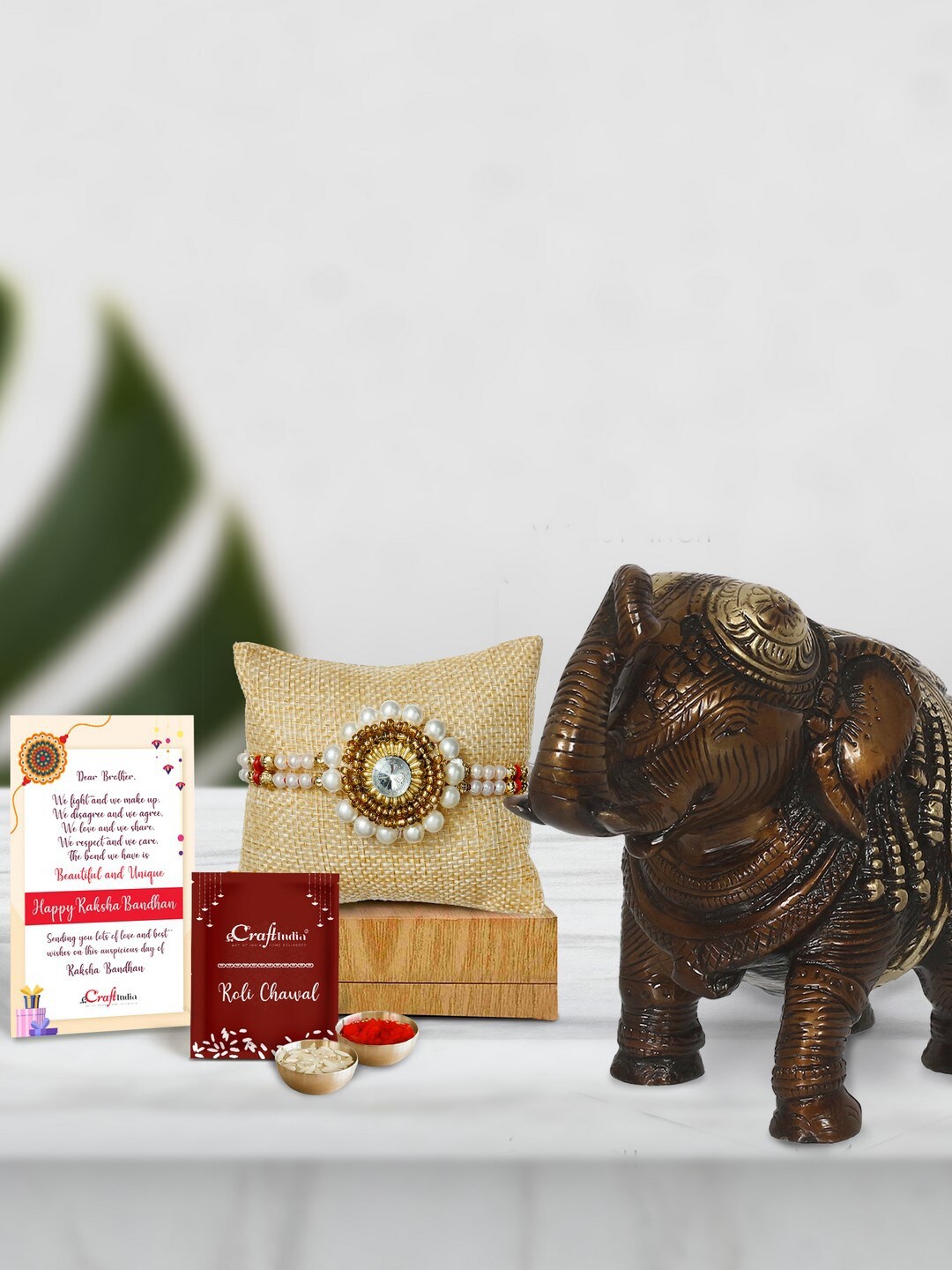 

eCraftIndia Gold-Toned & White Rakhi Gift Set