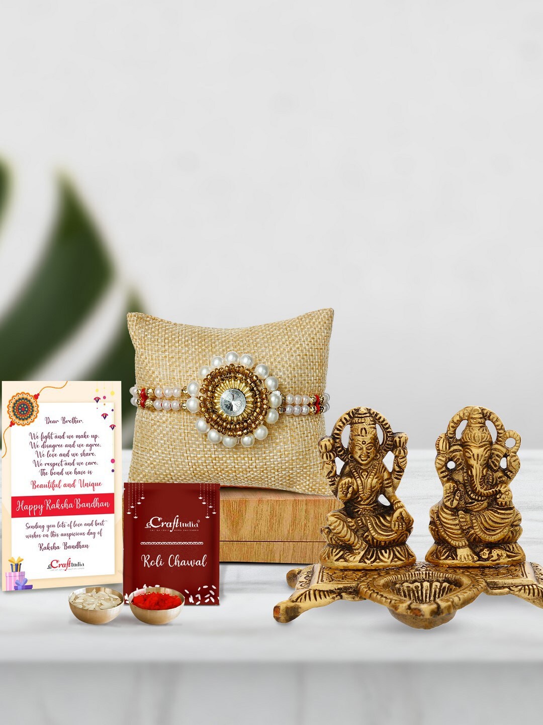 

eCraftIndia White & Gold-Toned Rakhi Gift