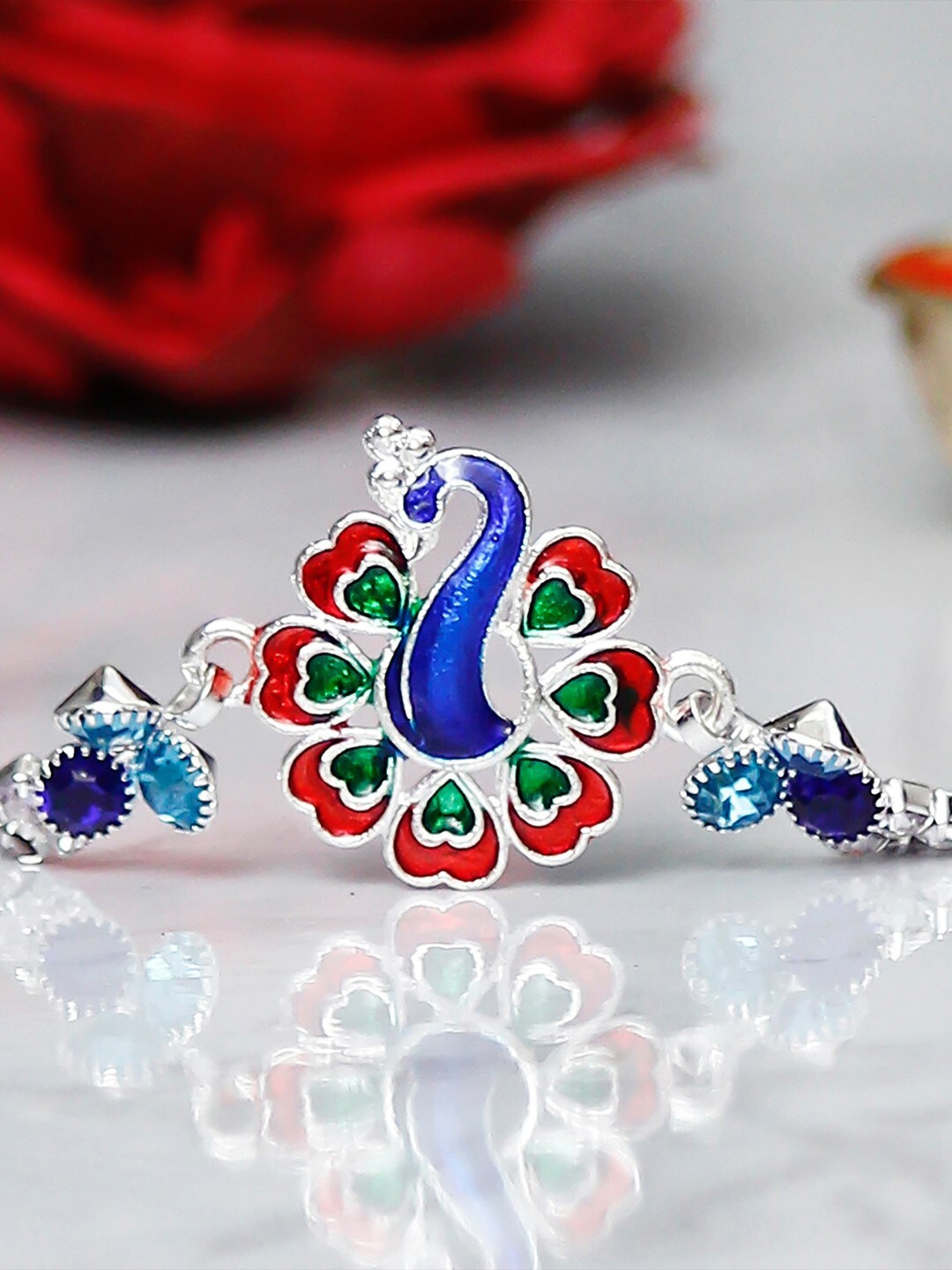 

eCraftIndia Blue & Red Designer Peocock Rakhi