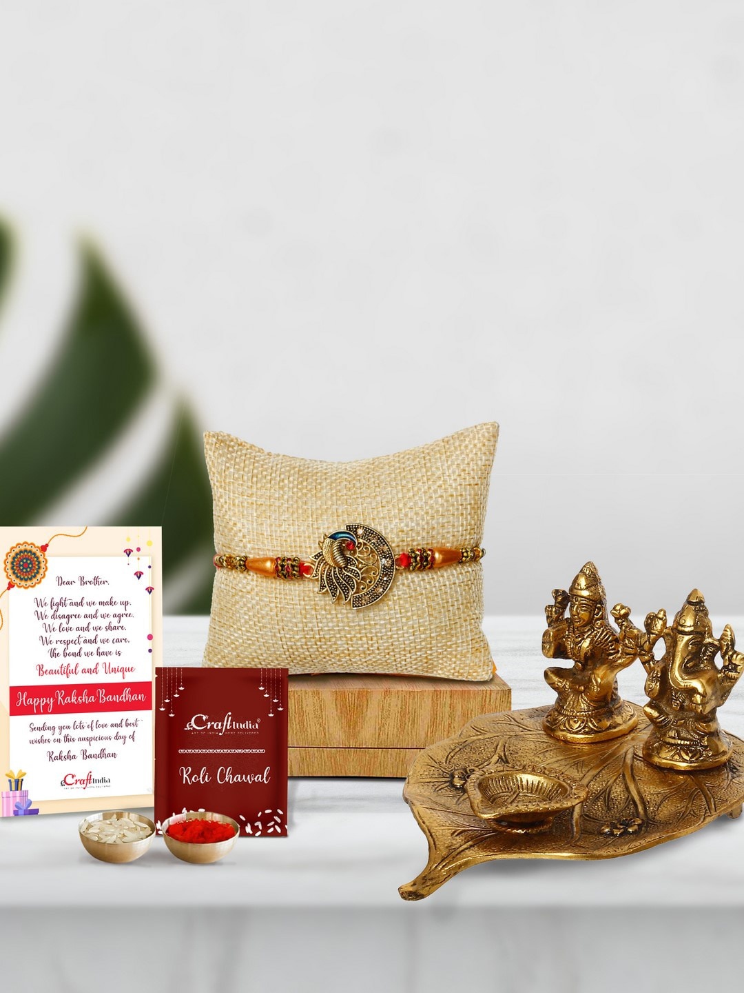 

eCraftIndia Gold-Toned Rakhi Gift