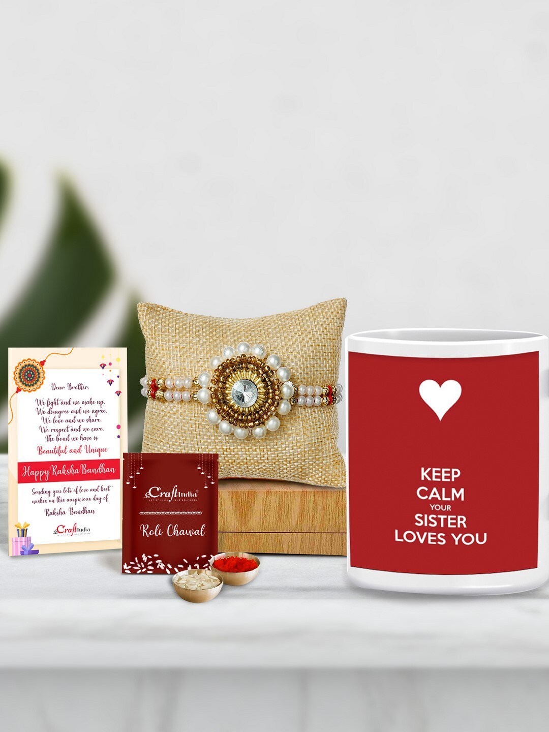 

eCraftIndia Gold-Toned & White Rakhi Gift Set