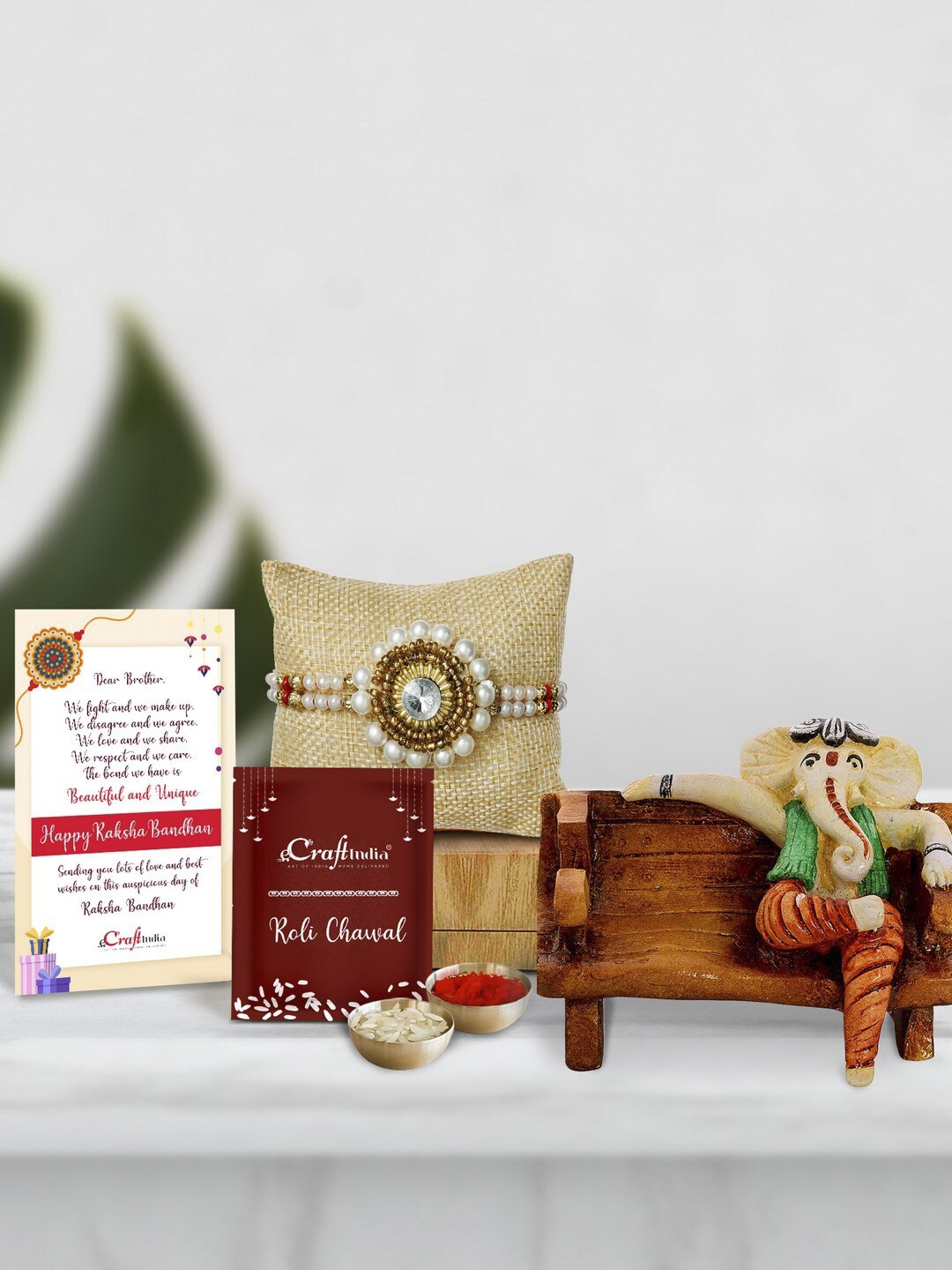 

eCraftIndia White & Gold-Toned Rakhi Gift Set