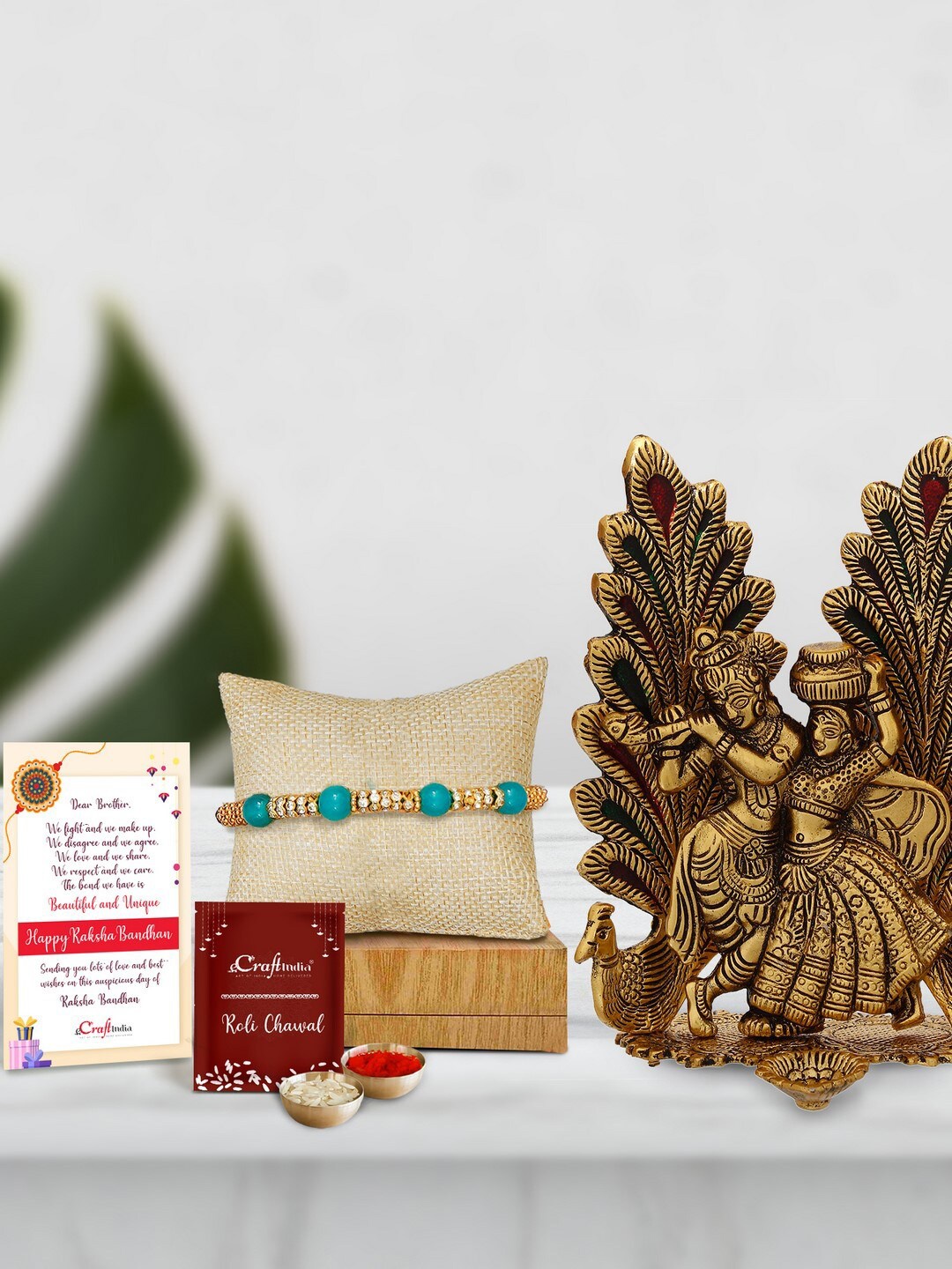

eCraftIndia Turquoise Blue & Gold-Toned Radha Krishna Idol Rakhi Gift Set