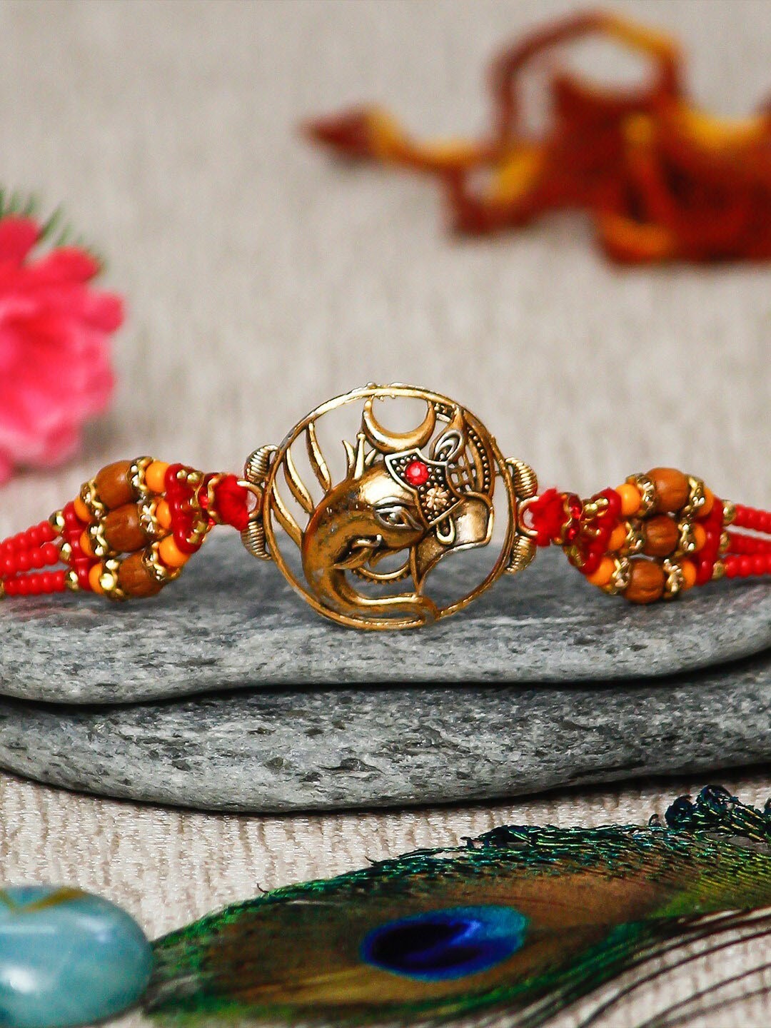 

eCraftIndia Gold-Toned & Red Designer Ganesha Rakhi