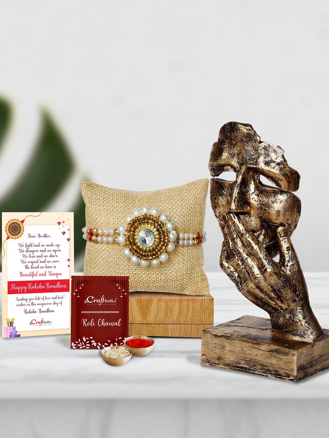 

eCraftIndia Gold-Toned & White Rakhi Gift Set