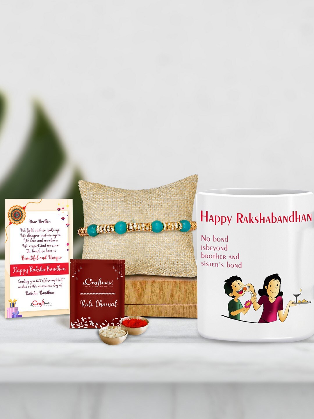 

eCraftIndia Turquoise Blue & Gold-Toned Mug Pearl Beaded Rakhi Gift Set