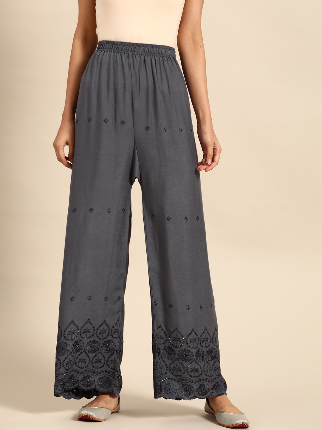 

Saadgi Women Grey Ethnic Motifs Embroidered Palazzos