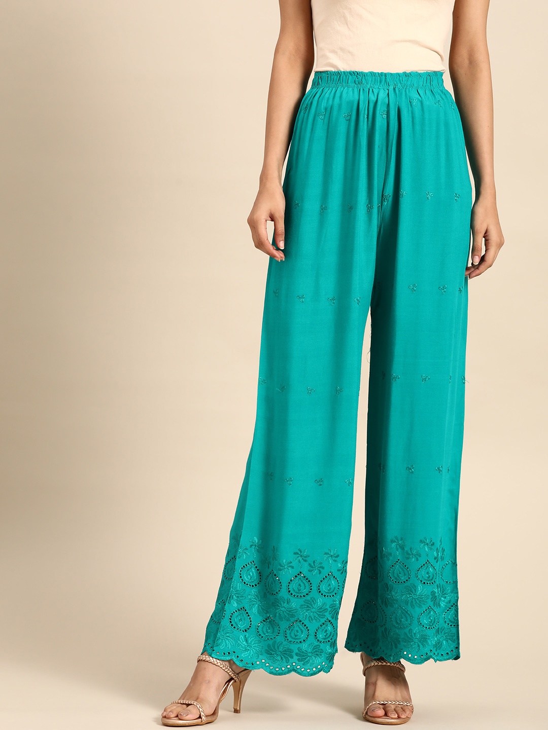 

Saadgi Women Teal Green Ethnic Motifs Embroidered Ethnic Palazzos