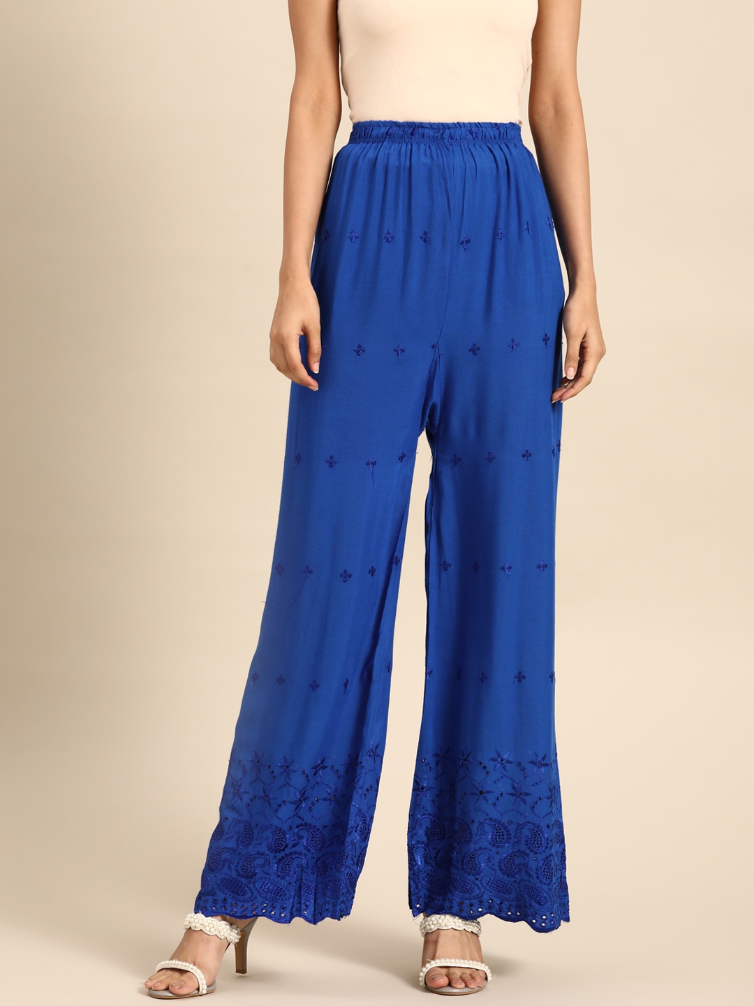 

Saadgi Women Blue Ethnic Motifs Embroidered Ethnic Palazzos