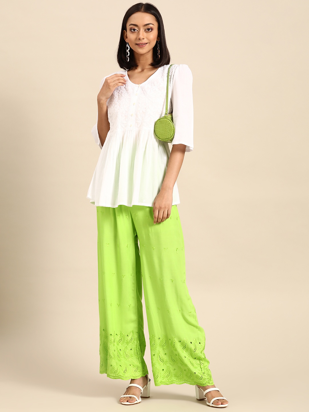 

Saadgi Women Green Ethnic Motifs Embroidered Palazzos